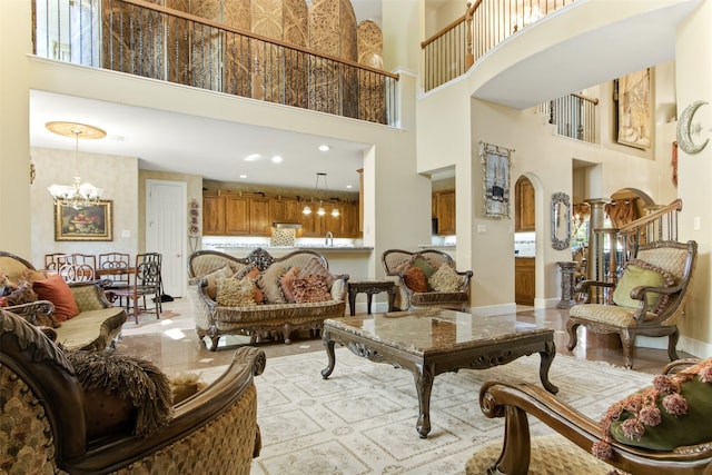 interior space featuring a high ceiling and a notable chandelier