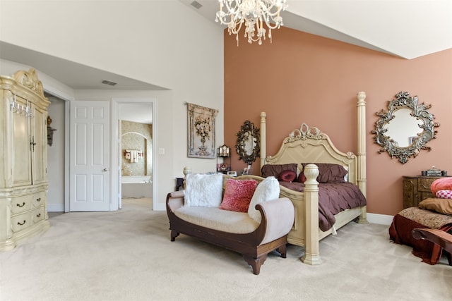 carpeted bedroom with lofted ceiling, connected bathroom, and a chandelier