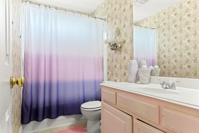 full bathroom with tile patterned floors, vanity, toilet, and shower / tub combo with curtain