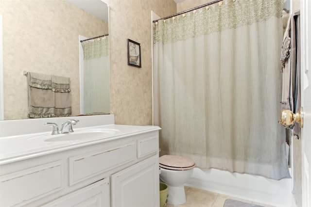 full bathroom featuring tile patterned flooring, shower / bath combo, vanity, and toilet