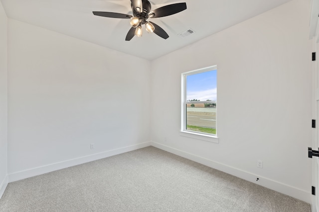 unfurnished room featuring ceiling fan and carpet flooring