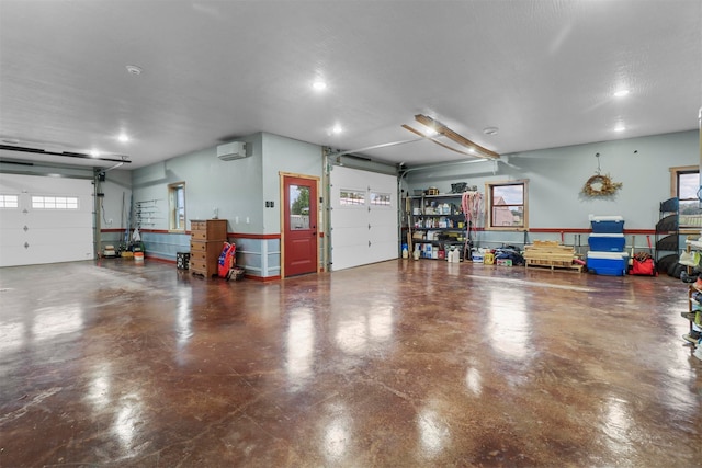 garage with an AC wall unit