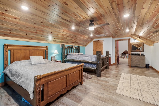 bedroom with wood-type flooring, ceiling fan, wooden ceiling, and vaulted ceiling