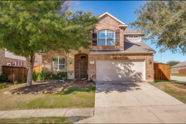 953 Lake Forest Trl, Little Elm, TX 75068 - traditional home featuring a garage, concrete driveway, and brick siding