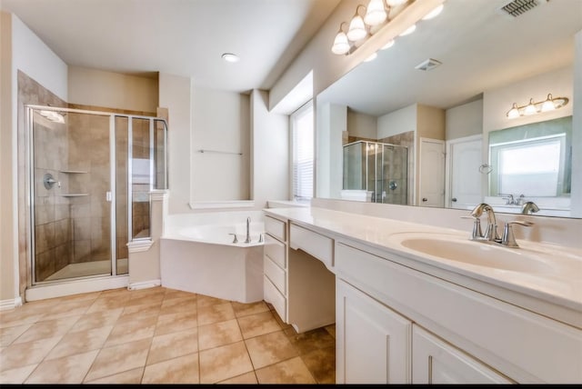 953 Lake Forest Trl, Little Elm, TX 75068 - full bathroom with vanity, a shower stall, a garden tub, and tile patterned flooring
