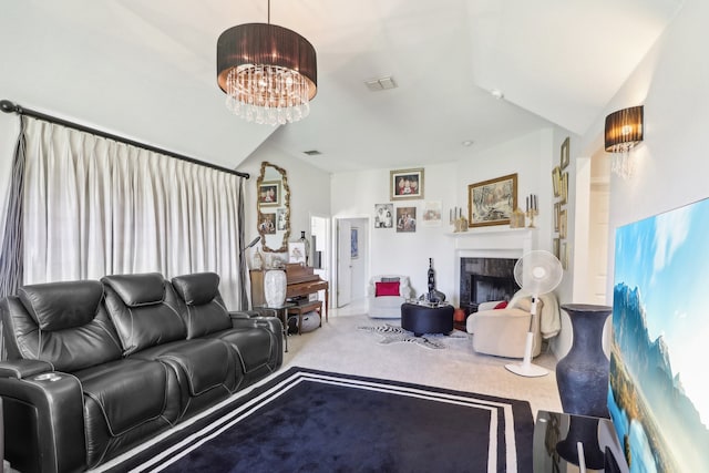 carpeted living room with vaulted ceiling and a chandelier