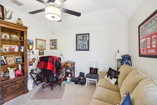 carpeted office featuring ceiling fan and vaulted ceiling