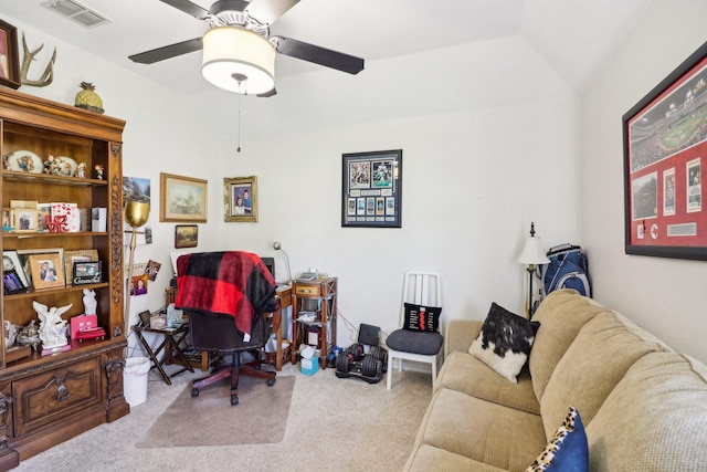 carpeted office with a ceiling fan, lofted ceiling, and visible vents