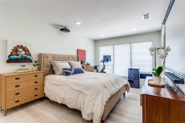 bedroom with light hardwood / wood-style flooring