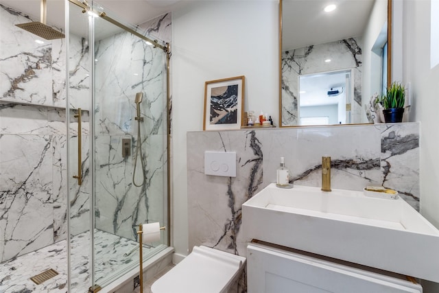 bathroom featuring vanity, tile walls, decorative backsplash, and a shower with shower door