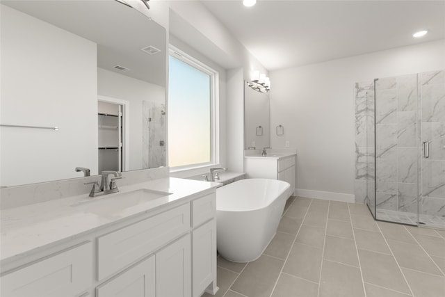bathroom with a stall shower, recessed lighting, visible vents, a sink, and a soaking tub
