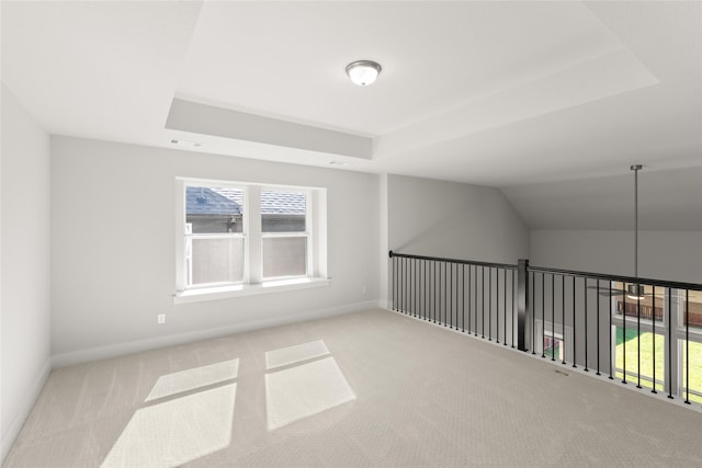 additional living space featuring carpet flooring, visible vents, and baseboards