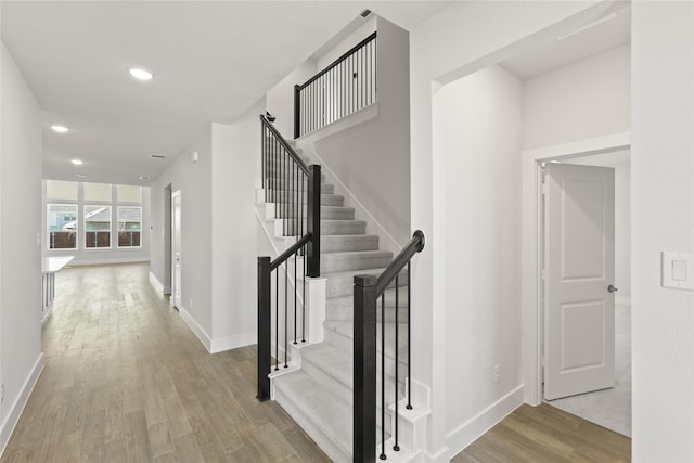 5265 Great Hollow Trl, Fort Worth, TX 76179 - corridor featuring recessed lighting, wood finished floors, baseboards, and stairs