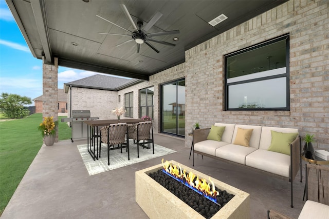 view of patio featuring ceiling fan, area for grilling, and an outdoor hangout area