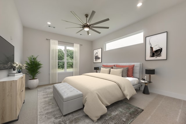 carpeted bedroom with ceiling fan