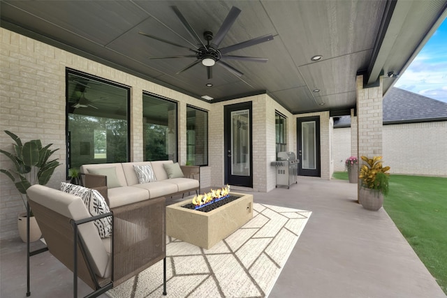 view of patio with an outdoor hangout area, area for grilling, and ceiling fan