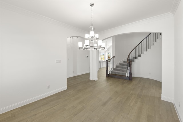 interior space featuring crown molding and hardwood / wood-style floors