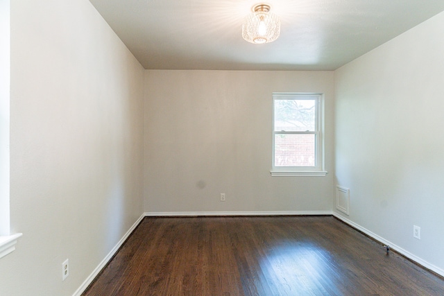 empty room featuring hardwood / wood-style floors