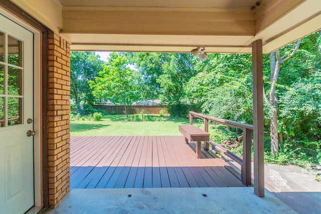 deck featuring a lawn