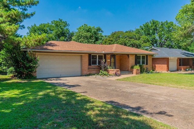 ranch-style home with a porch, a garage, and a front yard