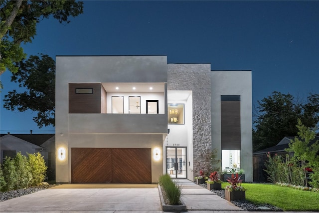 contemporary home with french doors and a garage