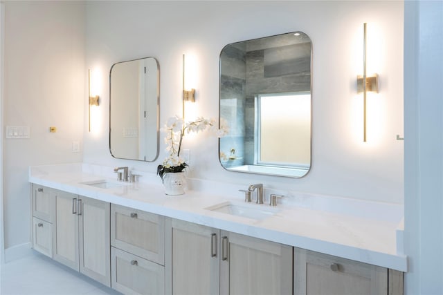 bathroom with vanity and tile patterned floors