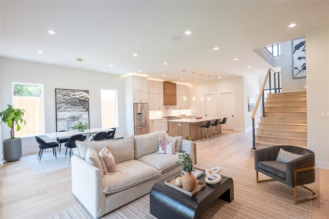 living room featuring light wood-type flooring