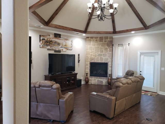 living room with beamed ceiling, dark hardwood / wood-style floors, and a stone fireplace