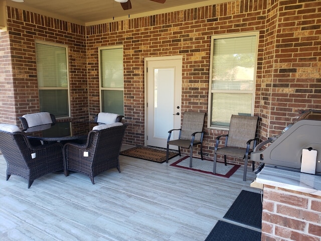 wooden deck with ceiling fan