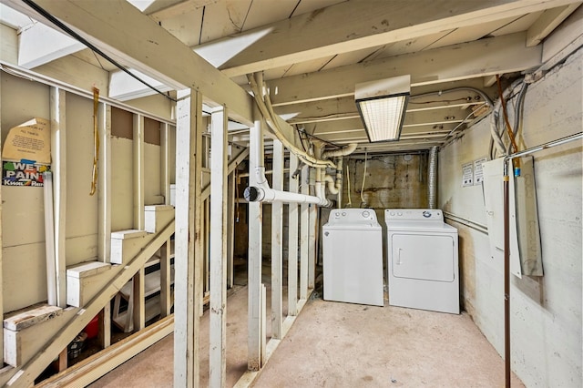 basement with washing machine and dryer