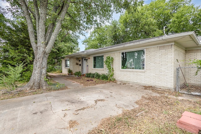 ranch-style home with a patio