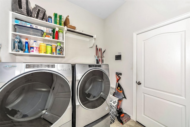 laundry area with independent washer and dryer