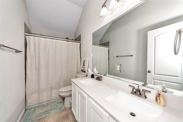 bathroom with vaulted ceiling, curtained shower, vanity, and toilet