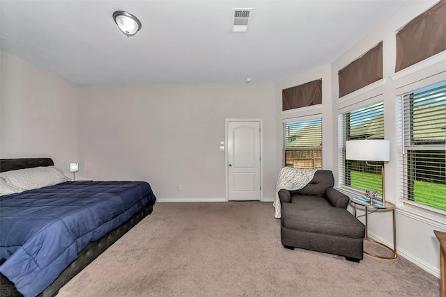 bedroom with light carpet