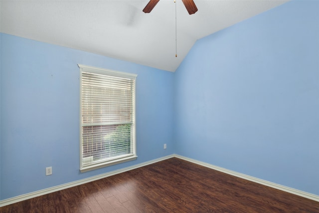 unfurnished room featuring hardwood / wood-style floors, ceiling fan, and vaulted ceiling