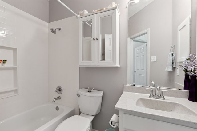 full bathroom featuring shower / bathing tub combination, vanity, and toilet