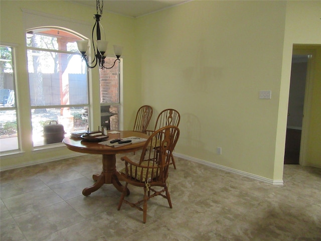 dining area with a chandelier