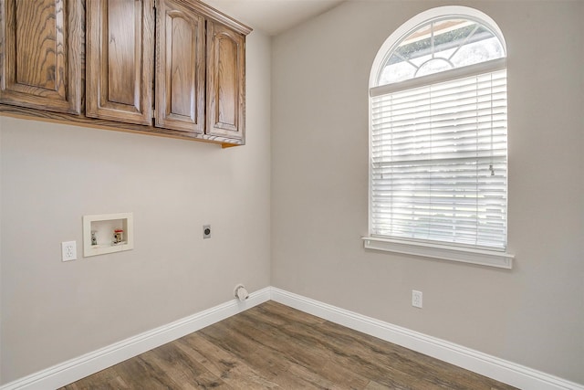 laundry area with washer hookup, dark wood-style flooring, cabinet space, hookup for an electric dryer, and baseboards