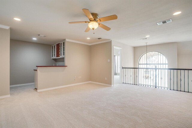 spare room with recessed lighting, visible vents, and light colored carpet