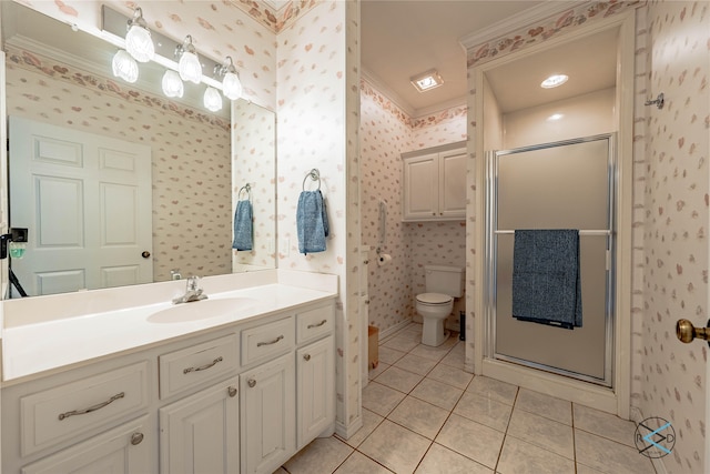 bathroom with vanity, ornamental molding, a shower with shower door, and tile patterned flooring