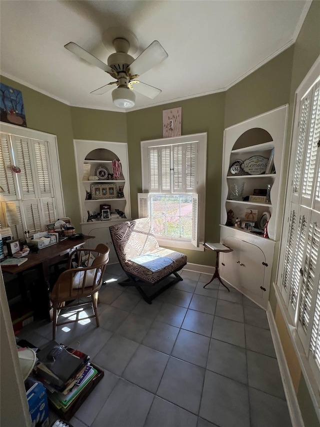 bedroom featuring tile floors, ornamental molding, and ceiling fan