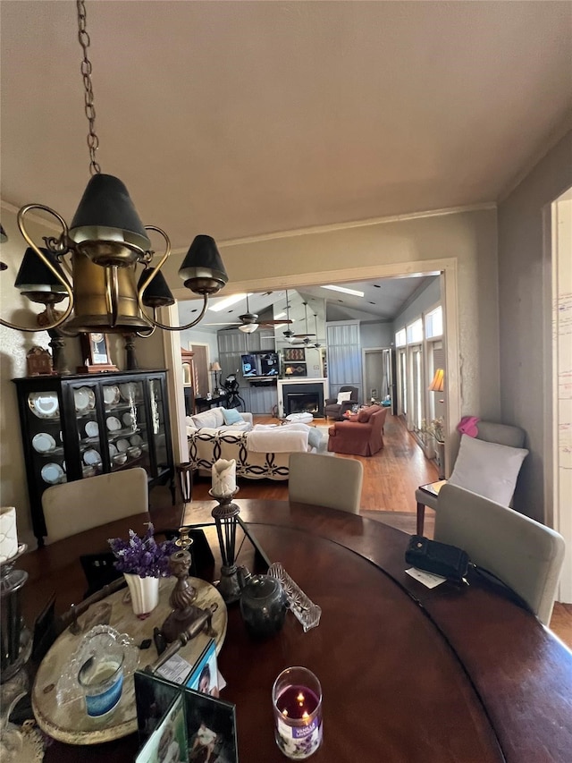 dining area featuring ceiling fan and wood-type flooring