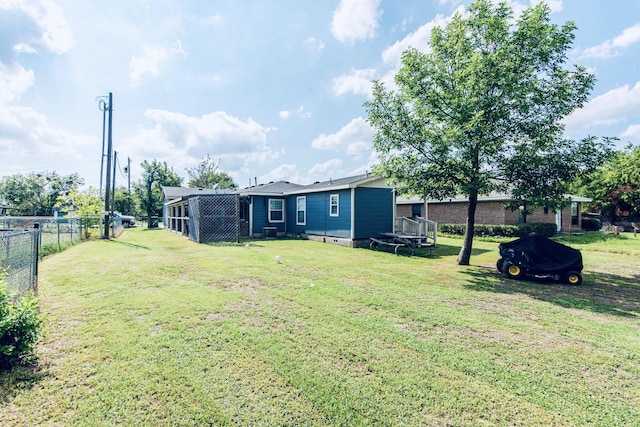 view of yard with a trampoline