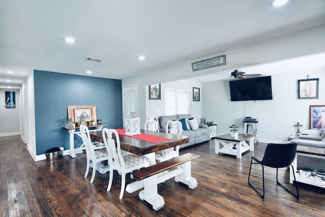 dining room featuring ceiling fan and dark hardwood / wood-style flooring