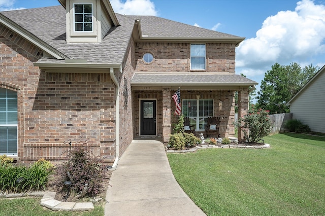 view of front of home with a front lawn