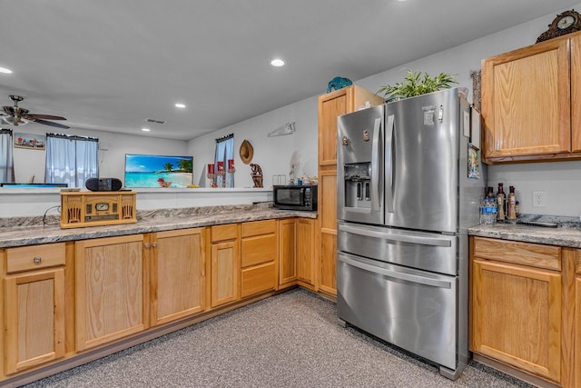 kitchen with ceiling fan, stainless steel fridge, kitchen peninsula, and light brown cabinets