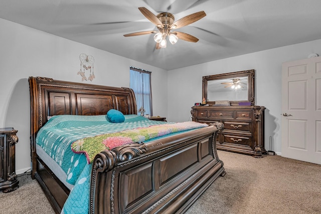 bedroom featuring ceiling fan and light colored carpet