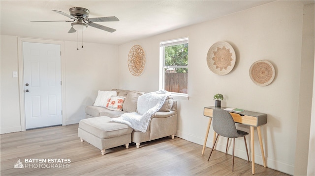 sitting room featuring ceiling fan and light hardwood / wood-style floors