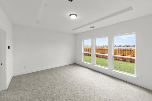 unfurnished room featuring carpet flooring