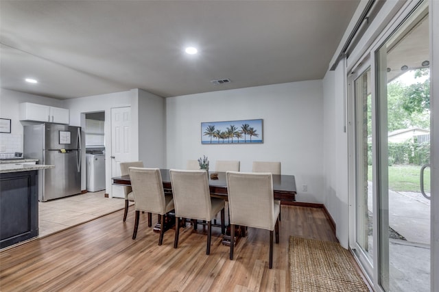 dining room featuring light wood-type flooring